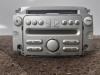 Radio CD player from a Daihatsu Sirion 2 (M3) 1.0 12V DVVT 2006