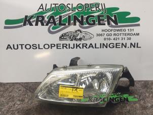 Używane Reflektor lewy Nissan Almera (N16) 1.8 16V Cena € 35,00 Procedura marży oferowane przez Autosloperij Kralingen B.V.