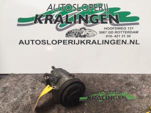 Usagé Pompe clim Nissan Almera (N16) 1.8 16V Prix € 80,00 Règlement à la marge proposé par Autosloperij Kralingen B.V.