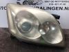 Headlight, right from a Toyota Avensis Wagon (T25/B1E) 2.2 D-4D 16V 2005