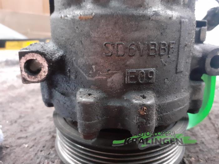 Air conditioning pump from a Opel Combo (Corsa C) 1.3 CDTI 16V 2006