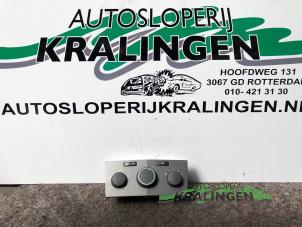 Usados Panel de control de calefacción Opel Astra H SW (L35) 1.8 16V Precio € 50,00 Norma de margen ofrecido por Autosloperij Kralingen B.V.