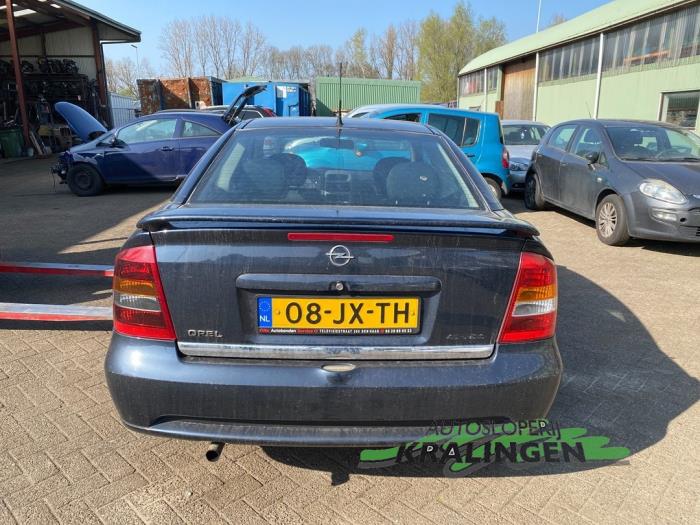 Opel Astra G] Does anyone have info on this spoiler? Apparently it should  be stock/from factory, but is it really? Was it an optional extra or is  this fitted from an OPC