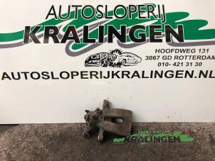 Used Rear brake calliper, left Renault Clio III (BR/CR) 1.6 16V Price € 50,00 Margin scheme offered by Autosloperij Kralingen B.V.