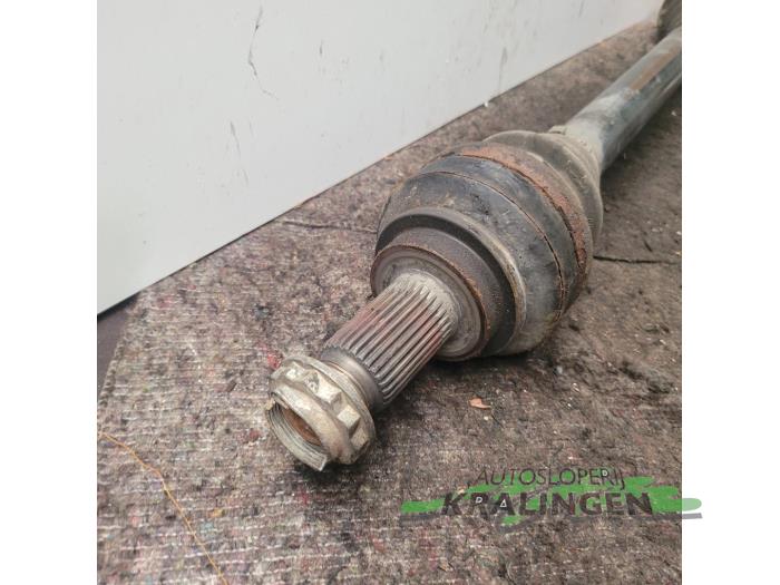 Drive shaft, rear left from a BMW 5 serie (E60) 525d 24V 2004