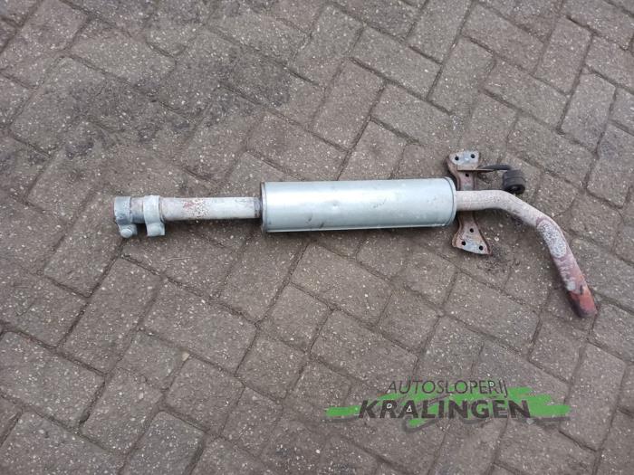 Exhaust middle silencer from a Volkswagen Polo III (6N1) 1.6i 75 1998