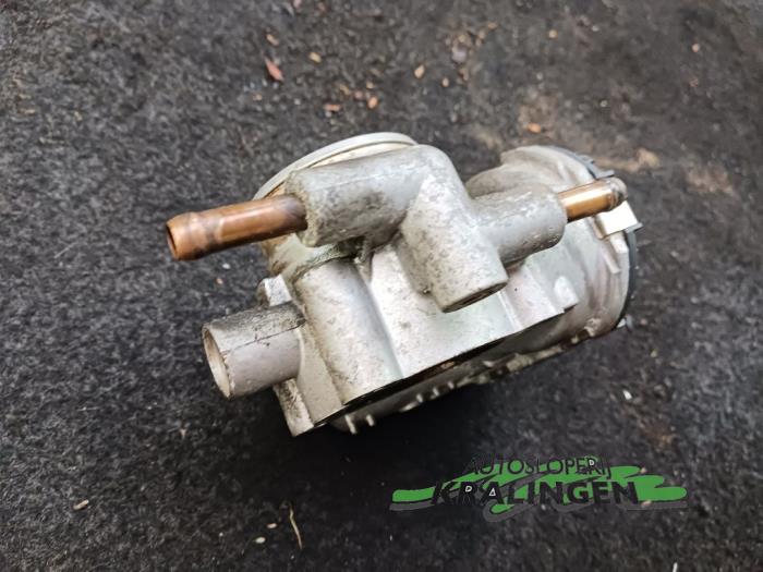 Spjällhus från en Opel Astra H GTC (L08) 1.4 16V Twinport 2005