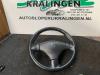 Steering wheel from a Peugeot 206 (2A/C/H/J/S), 1998 / 2012 1.6 16V, Hatchback, Petrol, 1.587cc, 80kW (109pk), FWD, TU5JP4; NFU, 2000-07 / 2009-04, 2ANFU; 2CNFU; 2HNFU; 2JNFU 2004
