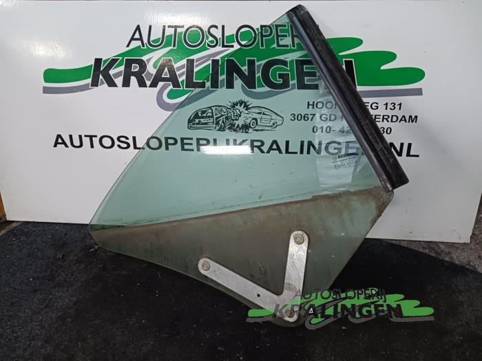 Usados Ventanilla triangular derecha detrás Renault Megane II CC (EM) 1.6 16V Precio € 49,99 Norma de margen ofrecido por Autosloperij Kralingen B.V.