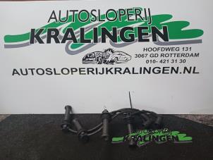 Usagé Kit câble bougie Ford Focus 1 1.4 16V Prix € 25,00 Règlement à la marge proposé par Autosloperij Kralingen B.V.