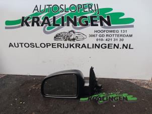 Usados Retrovisor externo izquierda Opel Meriva 1.6 16V Precio € 35,00 Norma de margen ofrecido por Autosloperij Kralingen B.V.