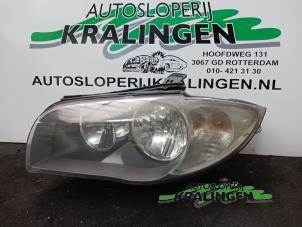 Used Headlight, left BMW 1 serie (E87/87N) 118d 16V Price € 75,00 Margin scheme offered by Autosloperij Kralingen B.V.