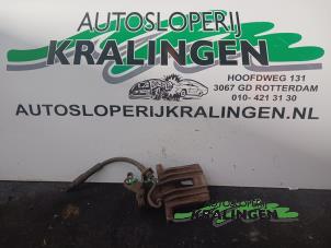 Used Rear brake calliper, left Volkswagen Golf Plus (5M1/1KP) 1.6 FSI 16V Price € 50,00 Margin scheme offered by Autosloperij Kralingen B.V.
