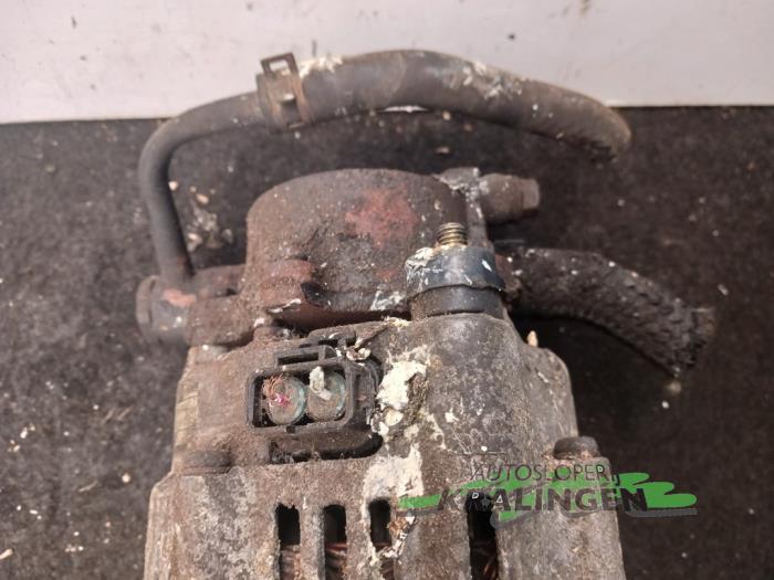 Dynamo van een Kia Carens II (FJ) 2.0 CRDI 16V 2004