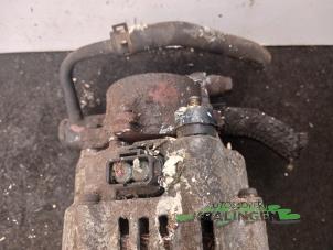 Dynamo van een Kia Carens II (FJ) 2.0 CRDI 16V 2004
