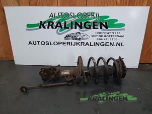 Used Fronts shock absorber, left Kia Rio II (DE) 1.4 16V Price € 50,00 Margin scheme offered by Autosloperij Kralingen B.V.
