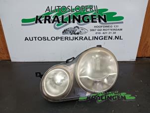 Used Headlight, left Volkswagen Polo IV (9N1/2/3) 1.2 12V Price € 40,00 Margin scheme offered by Autosloperij Kralingen B.V.