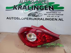 Usagé Feu arrière gauche Opel Corsa D 1.2 16V Prix sur demande proposé par Autosloperij Kralingen B.V.
