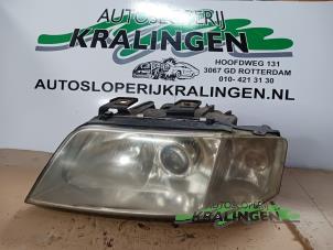 Używane Reflektor lewy Audi A6 Quattro (C5) 2.8 V6 30V Cena € 100,00 Procedura marży oferowane przez Autosloperij Kralingen B.V.