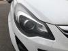 Reflektor prawy z Opel Corsa D 1.3 CDTi 16V ecoFLEX 2012