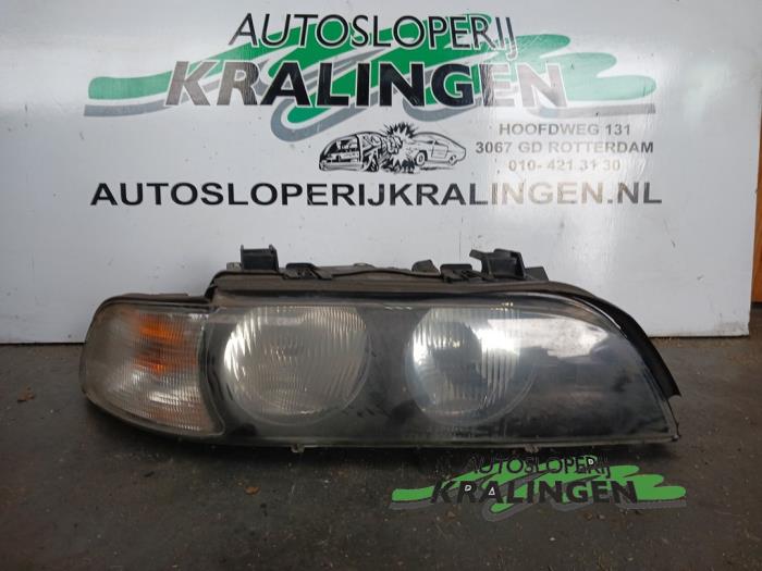 Headlight, right from a BMW 5 serie Touring (E39) 528i 24V 1997