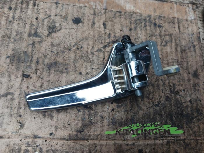 Handle from a Opel Corsa D 1.2 16V 2006
