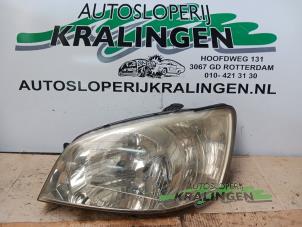 Used Headlight, left Hyundai Getz 1.3i 12V Price € 40,00 Margin scheme offered by Autosloperij Kralingen B.V.