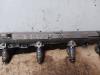 Injector (petrol injection) from a Volkswagen Golf IV (1J1) 1.6 16V 2001