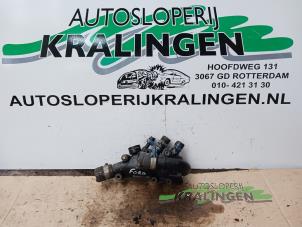 Usagé Boîtier thermostat Ford Ka I 1.3i Prix € 35,00 Règlement à la marge proposé par Autosloperij Kralingen B.V.