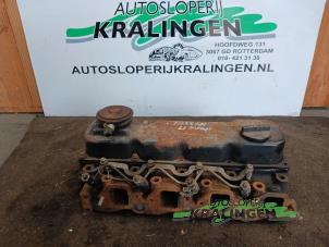 Used Cylinder head Nissan Urvan (E24) 2.7 D Price on request offered by Autosloperij Kralingen B.V.