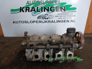 Używane Glowica cylindra Volkswagen Polo III (6N2) 1.4 Cena € 100,00 Procedura marży oferowane przez Autosloperij Kralingen B.V.