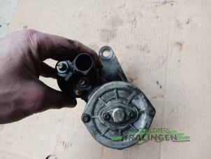 Startmotor från en Seat Ibiza IV SC (6J1) 1.4 16V 2009