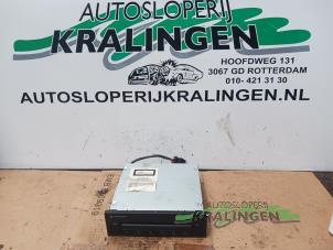Usagé Changeur de CD Volkswagen Golf V (1K1) 1.4 GT 16V Prix € 29,99 Règlement à la marge proposé par Autosloperij Kralingen B.V.