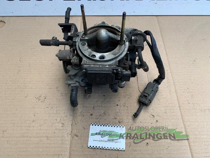 Gebrauchte Vergaser Nissan Primera (P10) 2.0i 16V SPi Kat. Preis auf Anfrage angeboten von Autosloperij Kralingen B.V.