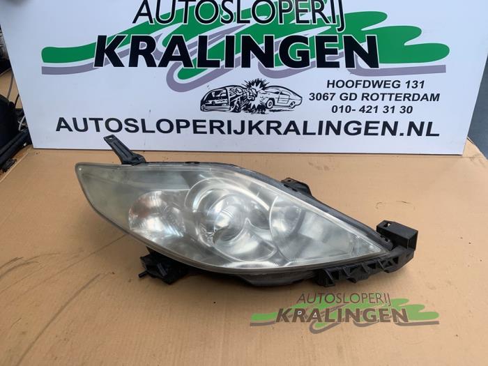 Używane Reflektor prawy Mazda 5 (CR19) 1.8i 16V Cena € 49,98 Procedura marży oferowane przez Autosloperij Kralingen B.V.