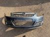Opel Corsa D 1.2 16V Parachoques