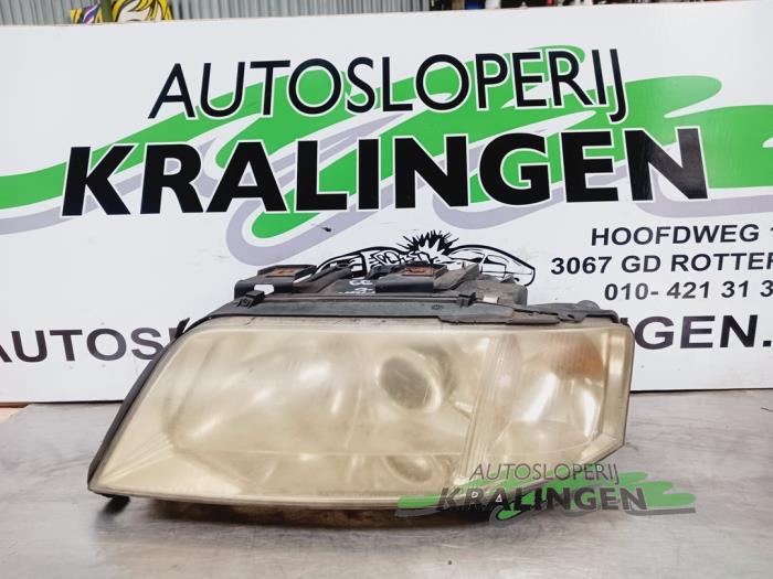 Używane Reflektor lewy Audi A6 Avant (C5) 1.8 20V Cena € 39,99 Procedura marży oferowane przez Autosloperij Kralingen B.V.