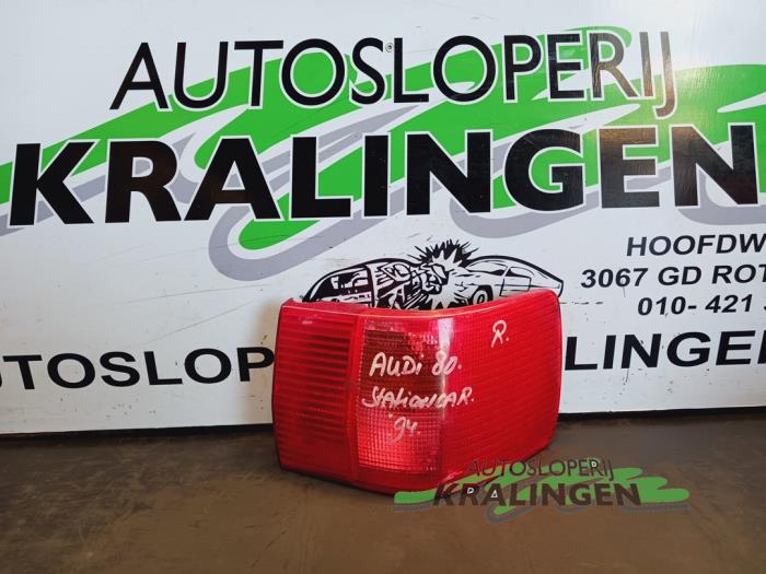 Tail light bulb cover holder