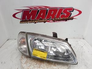 Used Headlight, right Nissan Almera (N16) 1.5 16V Price € 35,00 Margin scheme offered by Autosloopbedrijf gebr. Maris