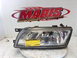 Used Headlight, left Nissan Almera (N16) 1.5 16V Price € 26,00 Margin scheme offered by Autosloopbedrijf gebr. Maris