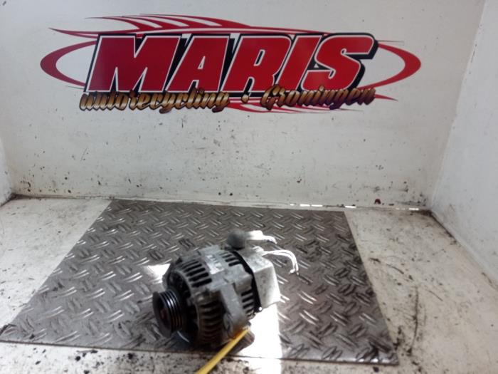 Begagnade Dynamo Daihatsu Cuore (L251/271/276) 1.0 12V DVVT Pris € 20,00 Marginaltabell erbjuds av Autosloopbedrijf gebr. Maris