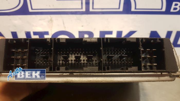 Engine management computer from a Volkswagen Passat Variant (3B5) 2.5 TDI V6 24V 1999