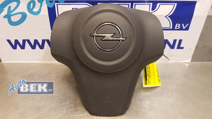 Left airbag (steering wheel) from a Opel Corsa D 1.3 CDTi 16V ecoFLEX 2007
