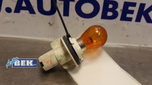 Used Headlight socket Nissan Micra (K13) 1.2 12V Price € 5,00 Margin scheme offered by Auto Bek