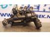 Thermostat housing from a Ford Ka I 1.3i 2004