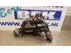 Thermostat housing from a Ford Ka I 1.3i 2004