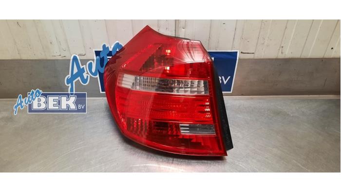 Taillight, left from a BMW 1 serie (E81) 116i 1.6 16V 2008