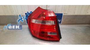 Used Taillight, left BMW 1 serie (E81) 116i 1.6 16V Price € 80,00 Margin scheme offered by Auto Bek