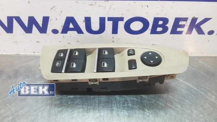 Usados Interruptor combinado de ventanillas BMW 7 serie (F01/02/03/04) 740d 24V Precio € 30,00 Norma de margen ofrecido por Auto Bek
