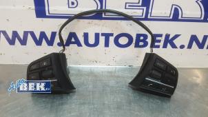 Used Steering wheel switch BMW 7 serie (F01/02/03/04) 740d 24V Price on request offered by Auto Bek
